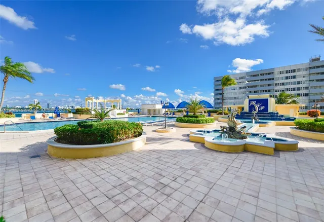 a view of a swimming pool and outdoor space
