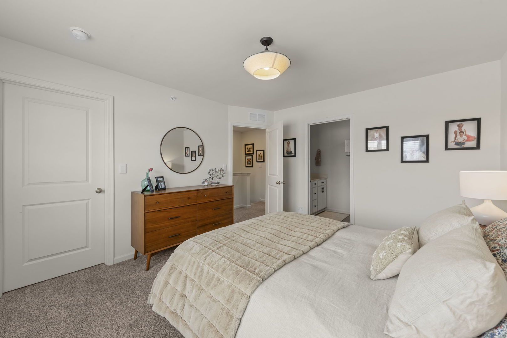 352 Bridgeview Court St. Charles, IL 60174 - Photo 14 of 20 a bedroom with a bed and a closet