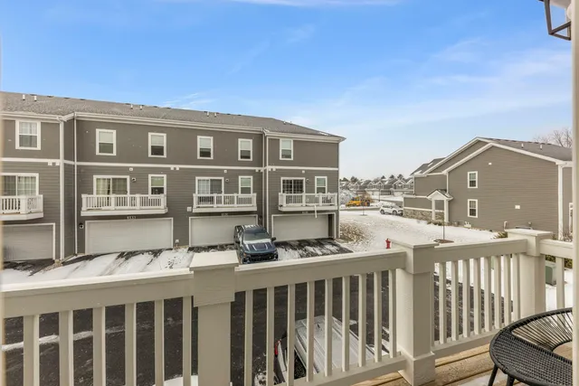 a view of a brick building from a balcony