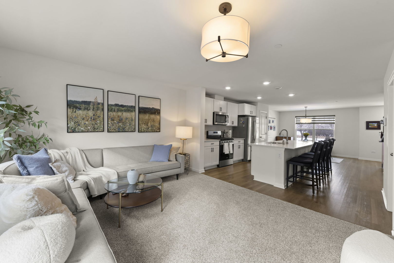 352 Bridgeview Court St. Charles, IL 60174 - Photo 7 of 20 a living room with furniture and kitchen view