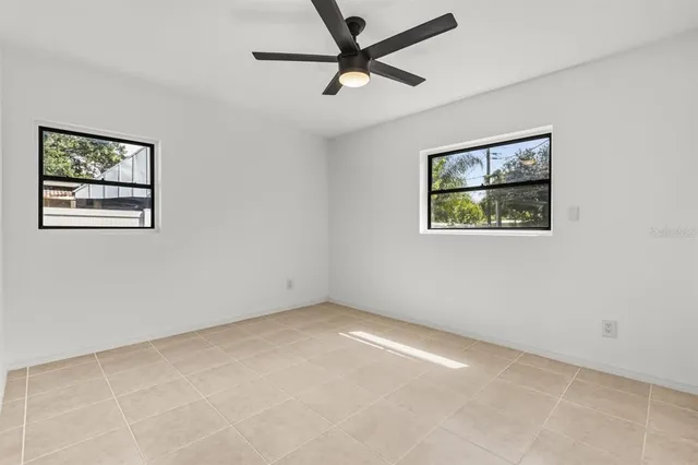 a view of a ceiling fan in a room