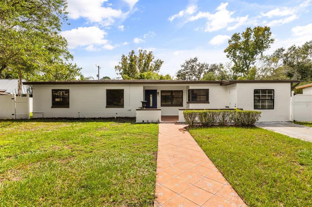 1816 Ivy Lane Winter Park, FL 32792 - Photo 2 of 35 a front view of house with yard patio and green space