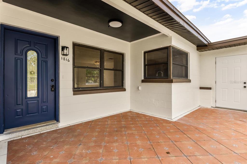 1816 Ivy Lane Winter Park, FL 32792 - Photo 24 of 35 a front view of a house with a porch