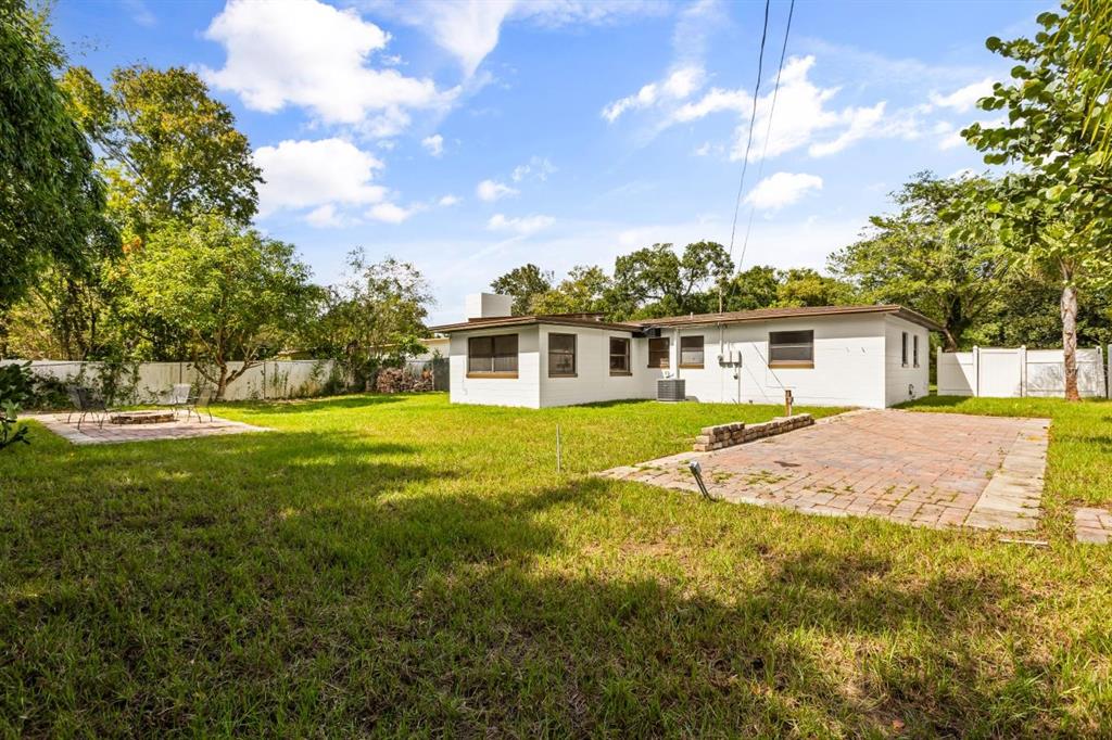 1816 Ivy Lane Winter Park, FL 32792 - Photo 28 of 35 a view of a house with a backyard