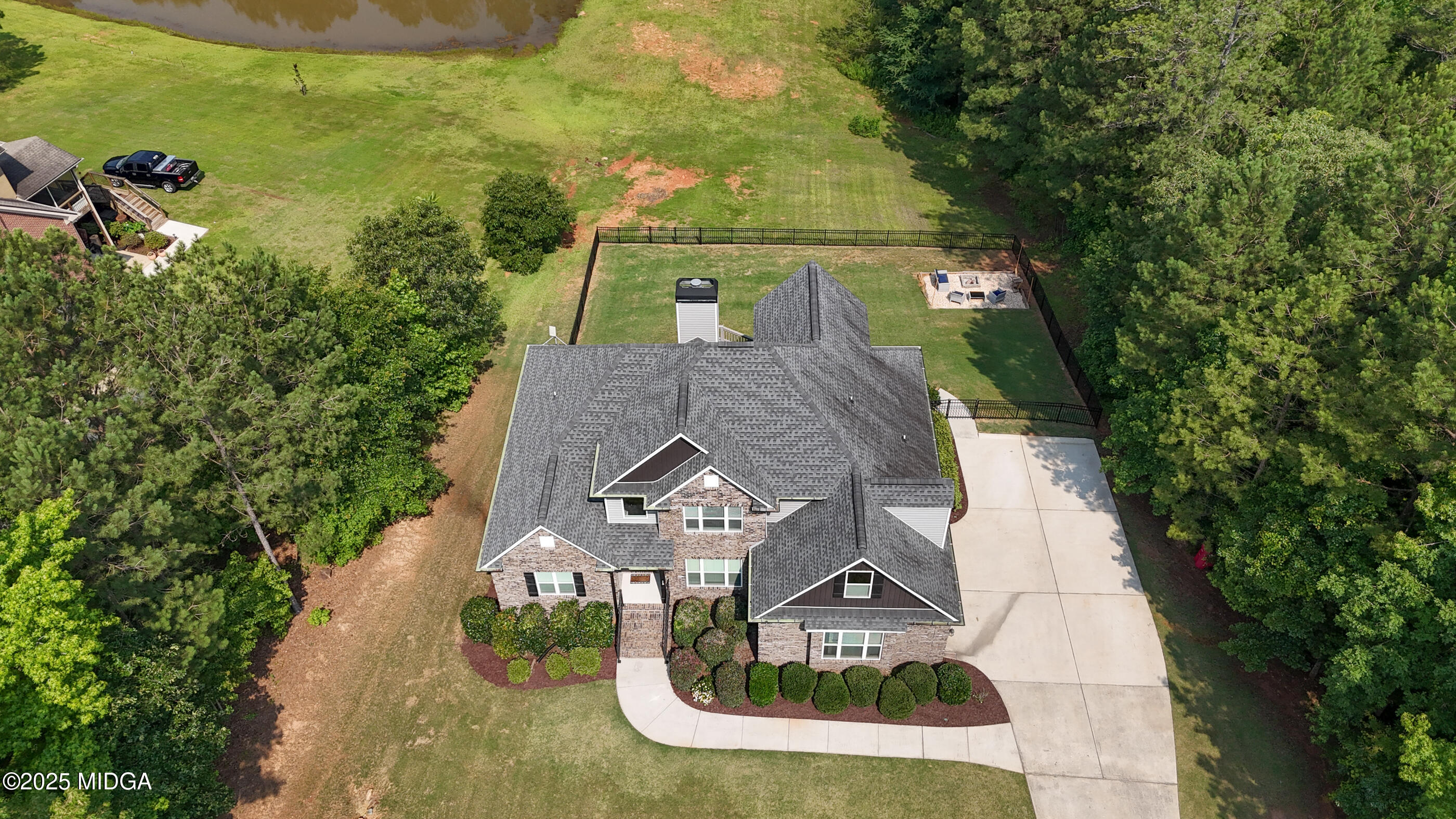 36 River Rapids Drive Forsyth, GA 31029 - Photo 45 of 57 an aerial view of a house with outdoor space swimming pool and mountains