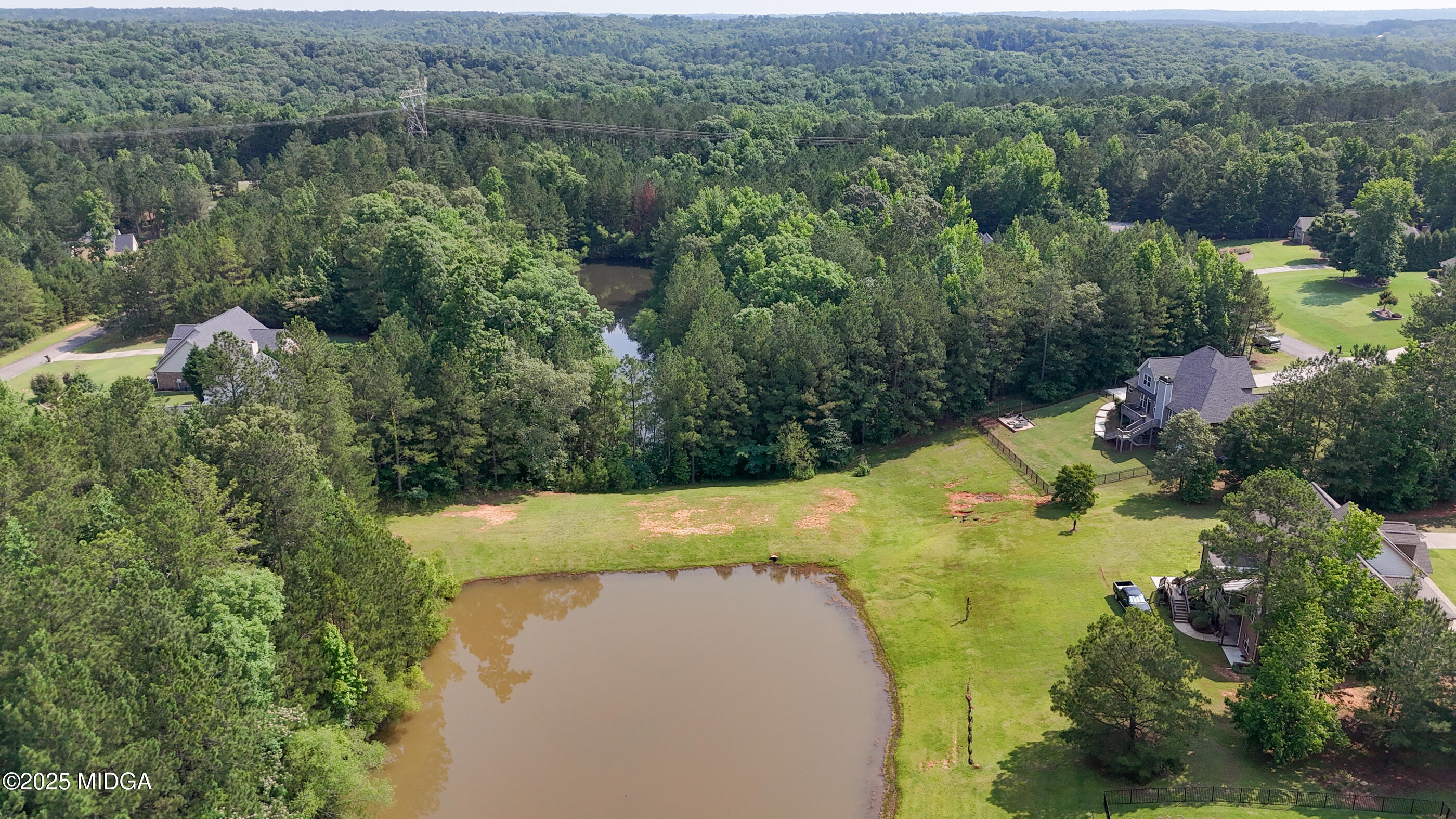 36 River Rapids Drive Forsyth, GA 31029 - Photo 49 of 57 an aerial view of a house with a yard