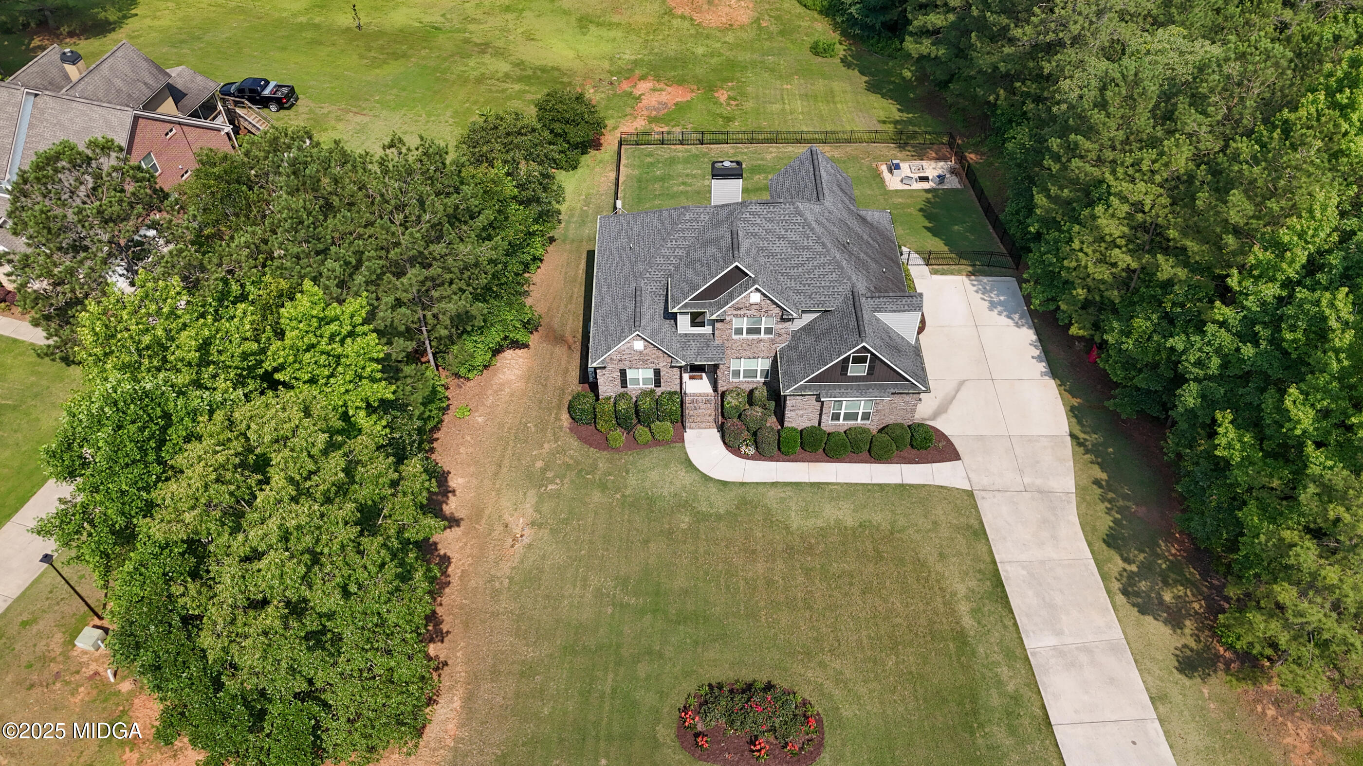 36 River Rapids Drive Forsyth, GA 31029 - Photo 54 of 57 an aerial view of a house with swimming pool and garden view