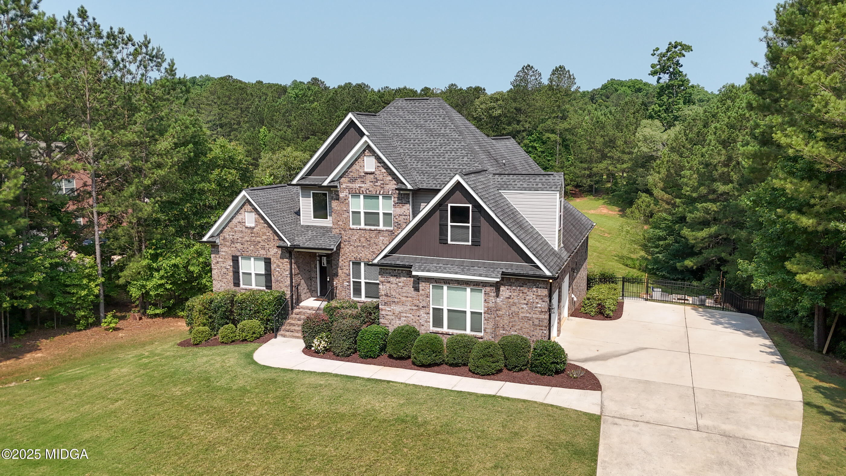 36 River Rapids Drive Forsyth, GA 31029 - Photo 57 of 57 a front view of a house with a yard