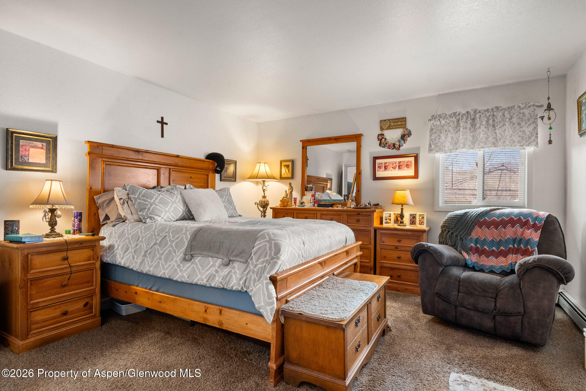 3127 Coal Mine Avenue Rifle, CO 81650 - Photo 12 of 21 a bedroom with a bed and a couch
