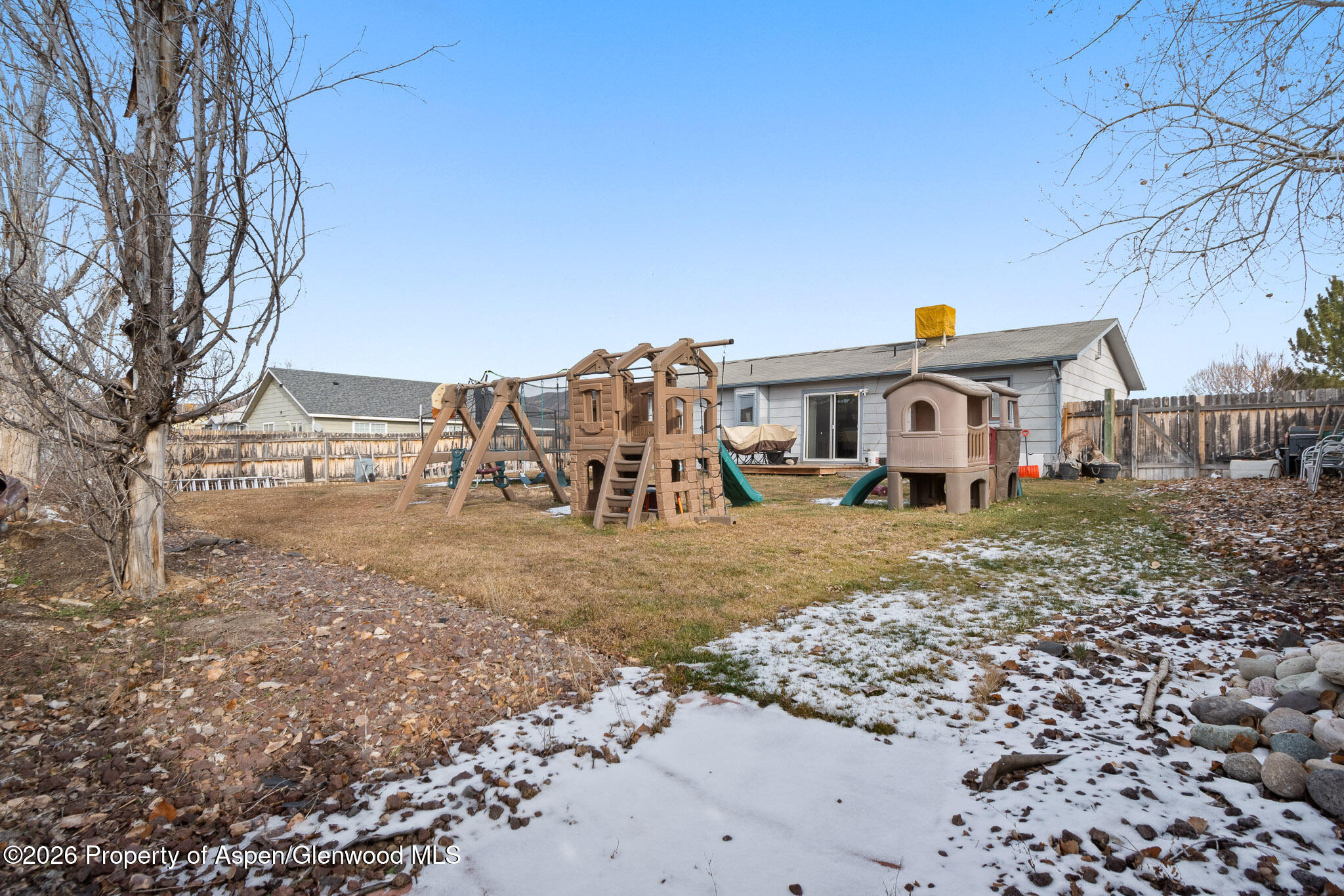 3127 Coal Mine Avenue Rifle, CO 81650 - Photo 20 of 21 a front view of a house with a yard