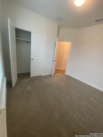 an empty room with closet