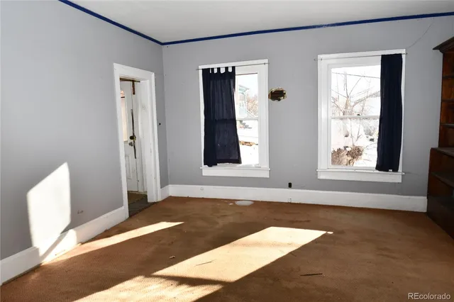 a view of an empty room with window