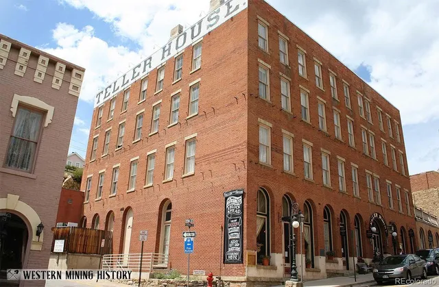 a front view of a building with street view