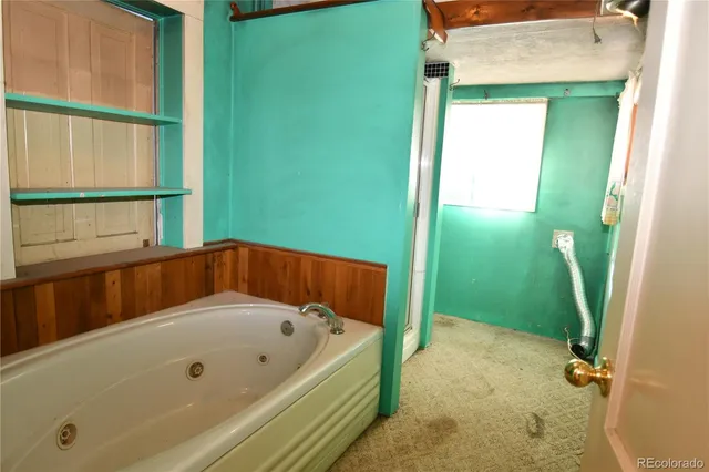 a bathroom with a sink and toilet