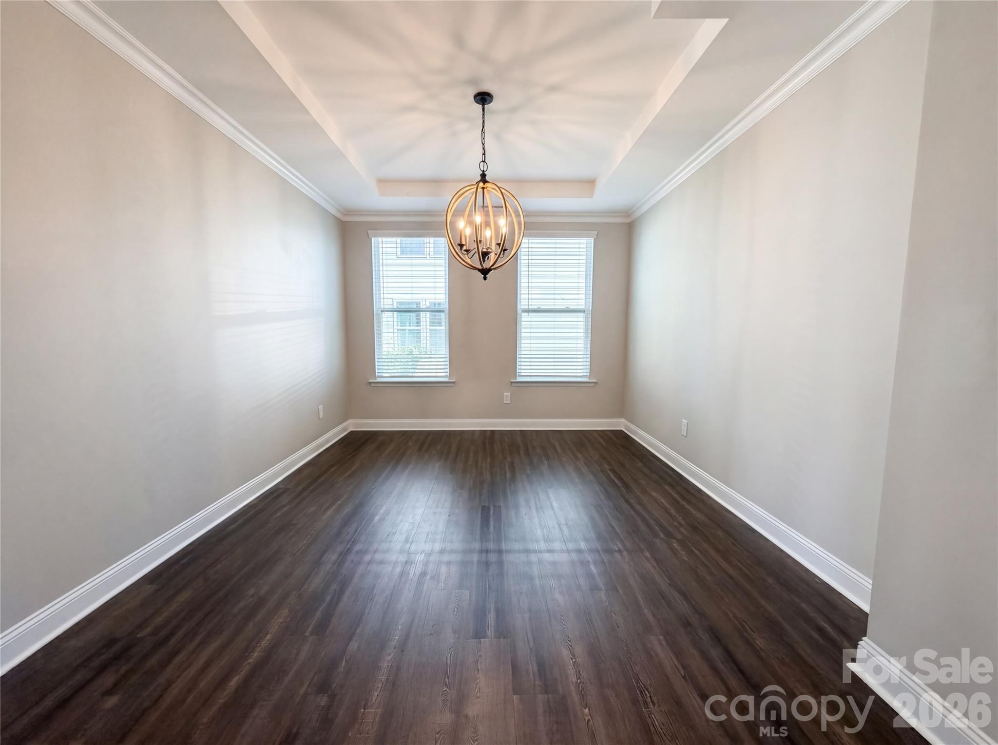 1321 Fishing Creek Road Clover, SC 29710 - Photo 8 of 19 an empty room with wooden floor and windows