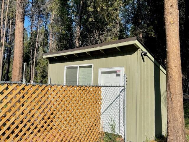 16868 Hermosa Road Bend, OR 97707 - Photo 11 of 40 a front view of a house with a yard