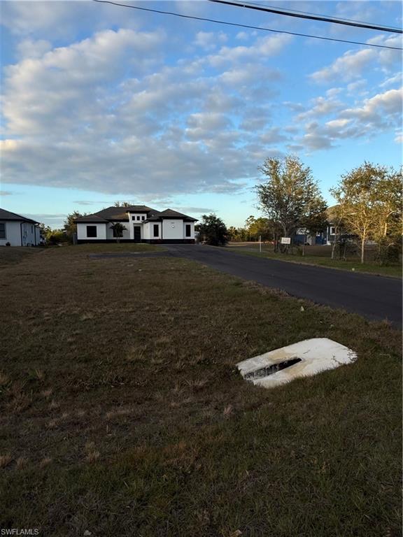 4353 22nd Avenue Northeast Naples, FL 34120 - Photo 3 of 18 a view of lake and mountain
