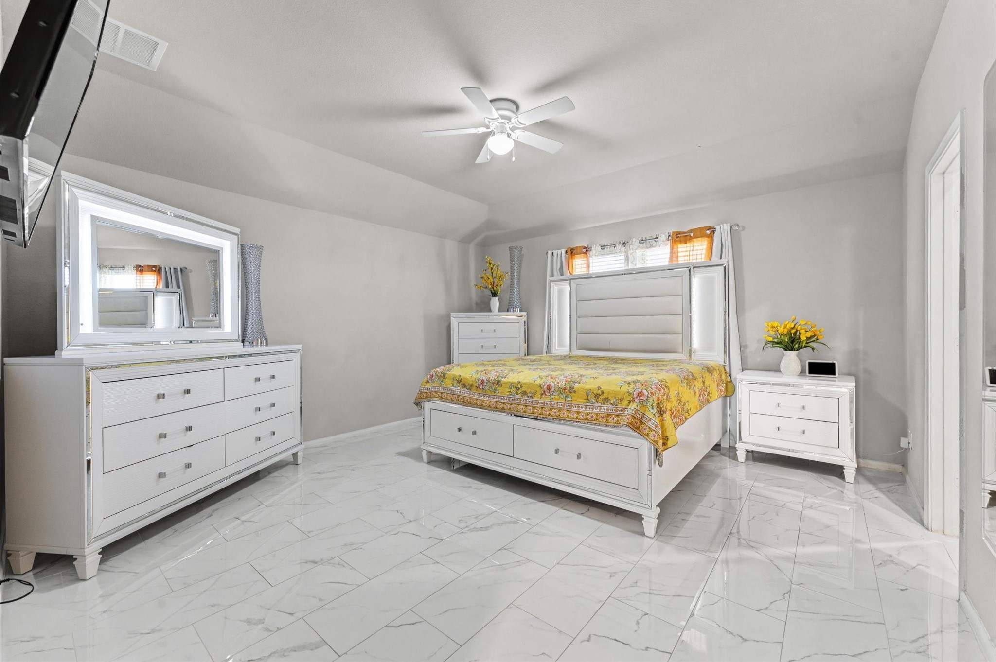 21610 Lemon Beebrush Lane Katy, TX 77449 - Photo 14 of 25 a spacious bedroom with a bed and window