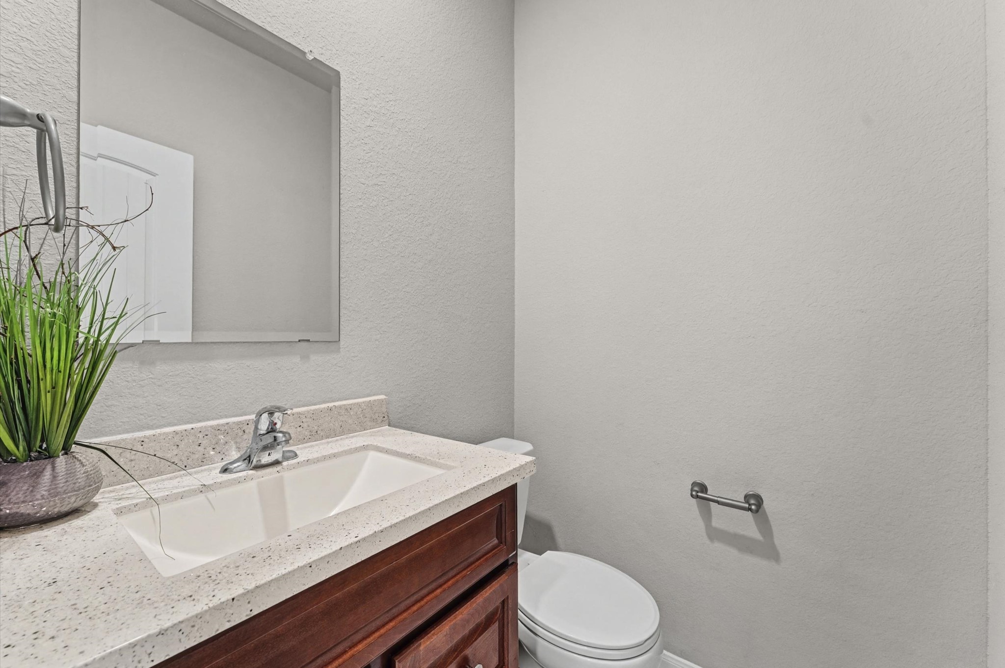 21610 Lemon Beebrush Lane Katy, TX 77449 - Photo 20 of 25 a bathroom with a granite countertop sink a toilet and a mirror