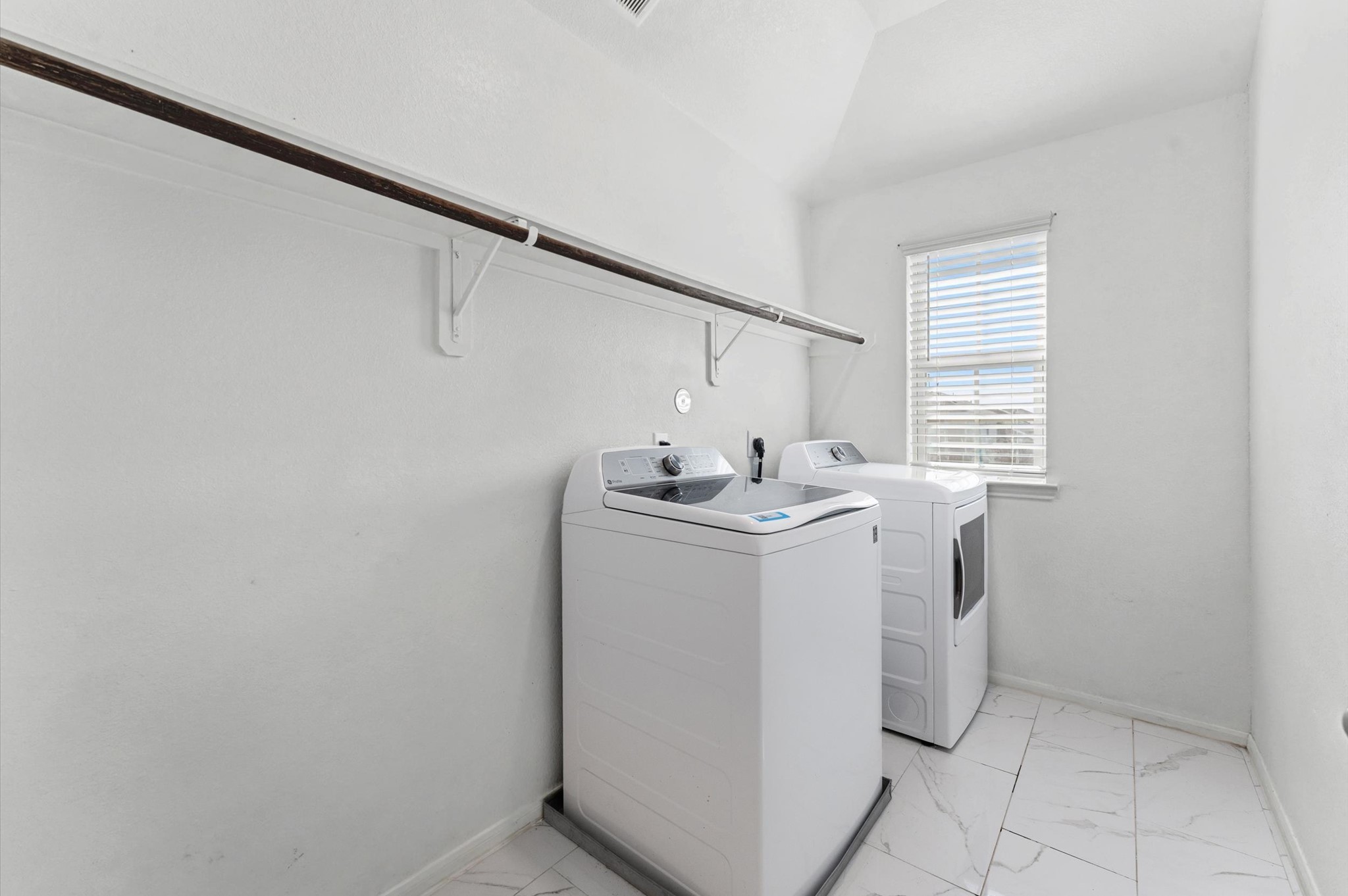 21610 Lemon Beebrush Lane Katy, TX 77449 - Photo 21 of 25 a utility room with dryer and washer