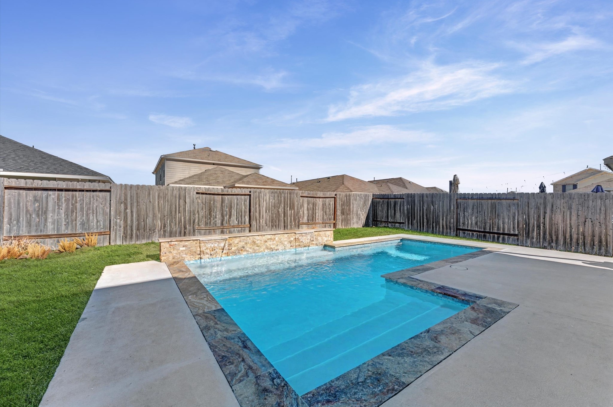 21610 Lemon Beebrush Lane Katy, TX 77449 - Photo 24 of 25 a view of a backyard with swimming pool in the background