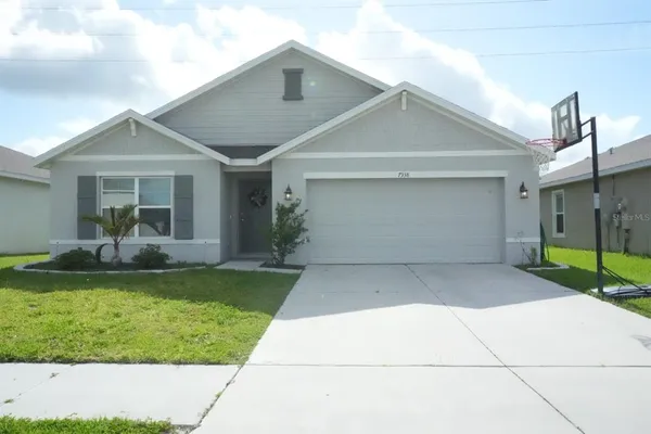 a front view of house with yard