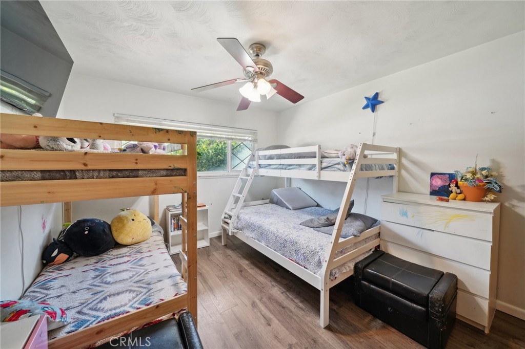6769 Sunset Circle Riverside, CA 92505 - Photo 27 of 54 a living room with furniture and a chandelier