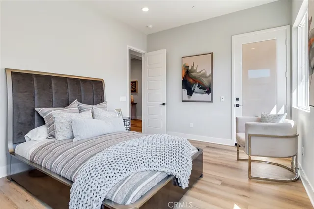 a bathroom with a sink toilet and mirror