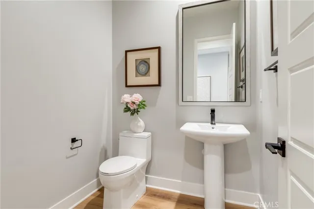 a bedroom with a bed and cabinets