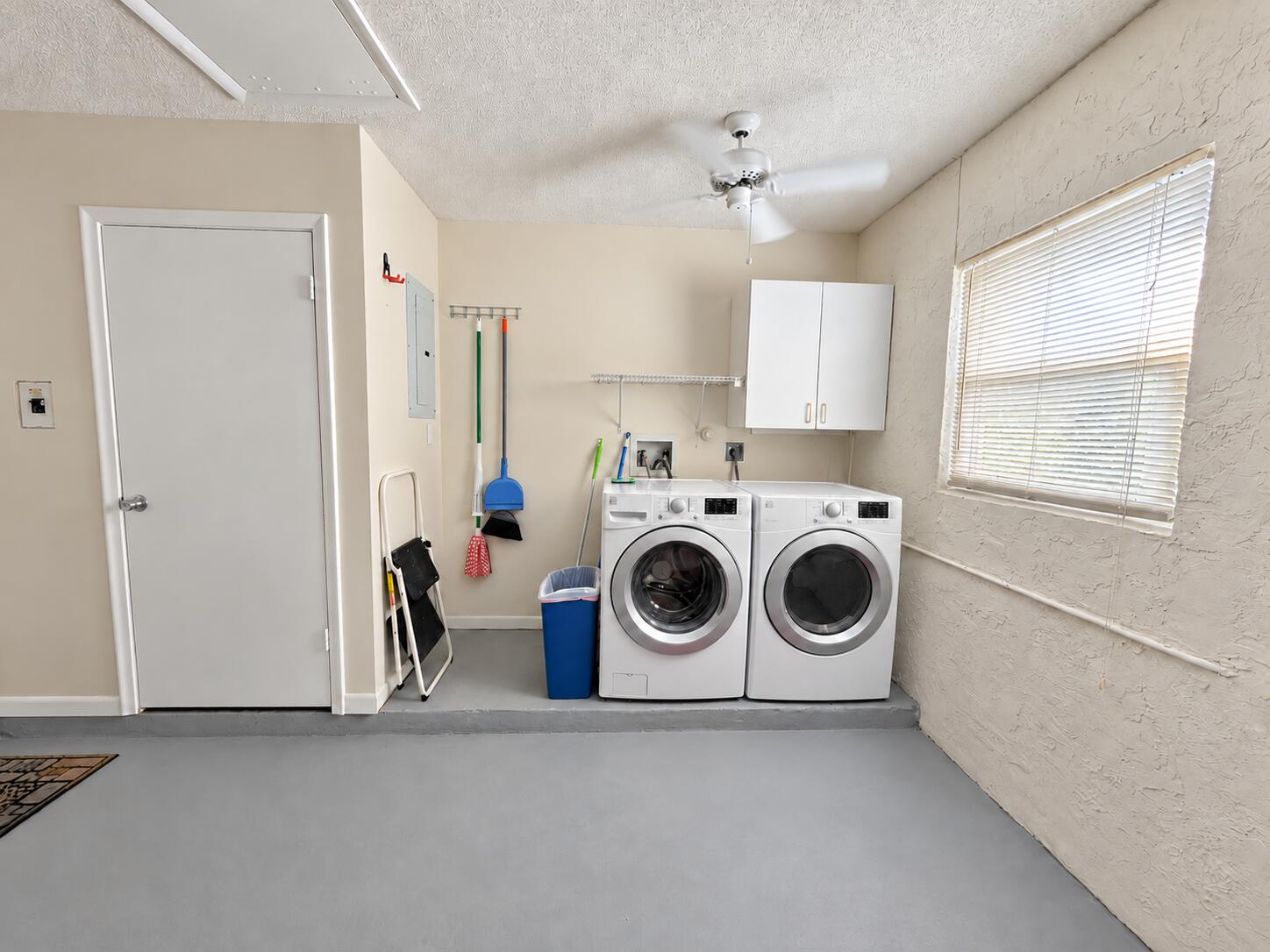 6309 Dusenburg Road Delray Beach, FL 33484 - Photo 23 of 26 Rug-free laundry room with seamless gray