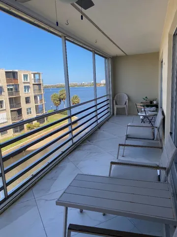a spacious bathroom with a double vanity sink mirror and toilet