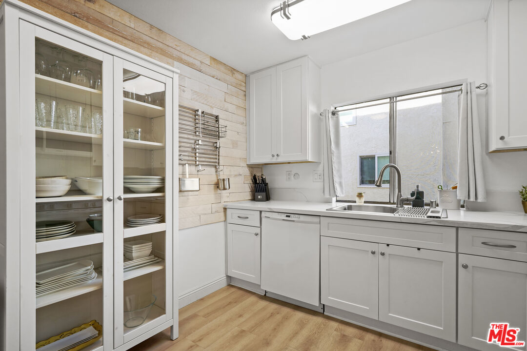 5245 Coldwater Canyon Avenue, Unit C Sherman Oaks, CA 91401 - Photo 12 of 55 a kitchen with cabinets and window