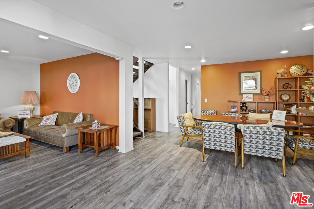 5245 Coldwater Canyon Avenue, Unit C Sherman Oaks, CA 91401 - Photo 50 of 55 a living room with furniture and wooden floor