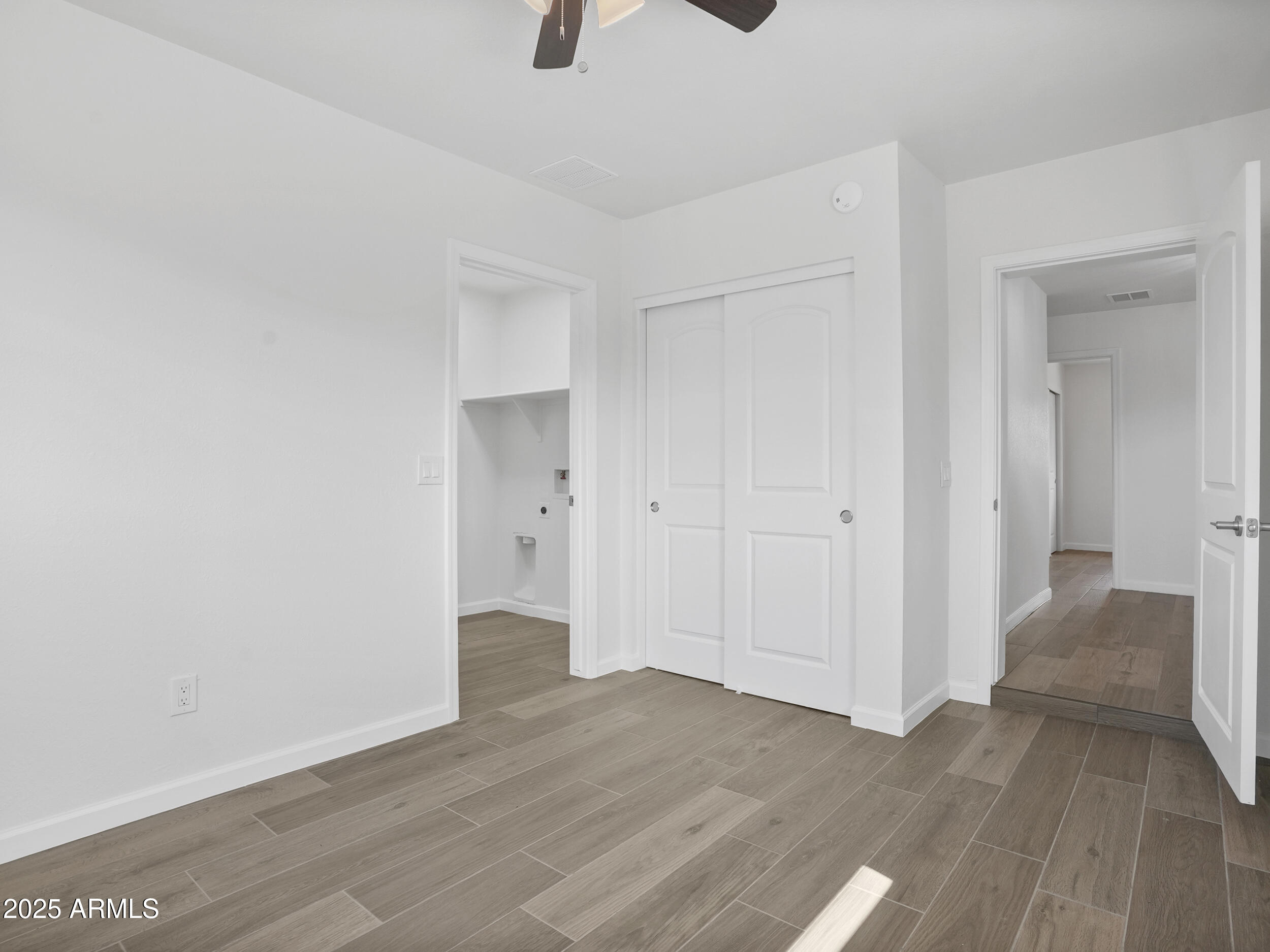 1046 East Elm Street Phoenix, AZ 85014 - Photo 11 of 31 a view of a room with wooden floor