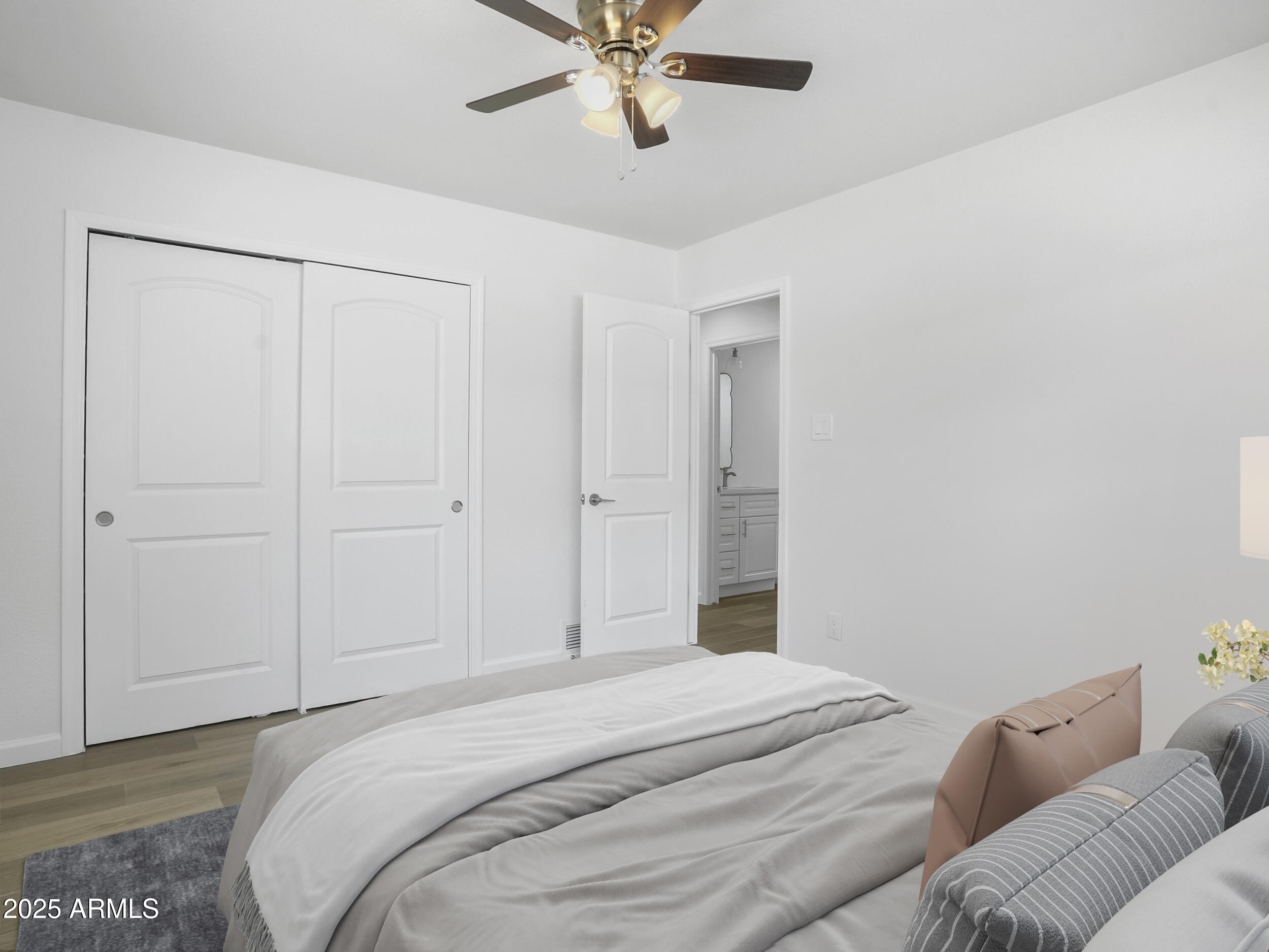 1046 East Elm Street Phoenix, AZ 85014 - Photo 18 of 31 a bedroom with a bed and closet