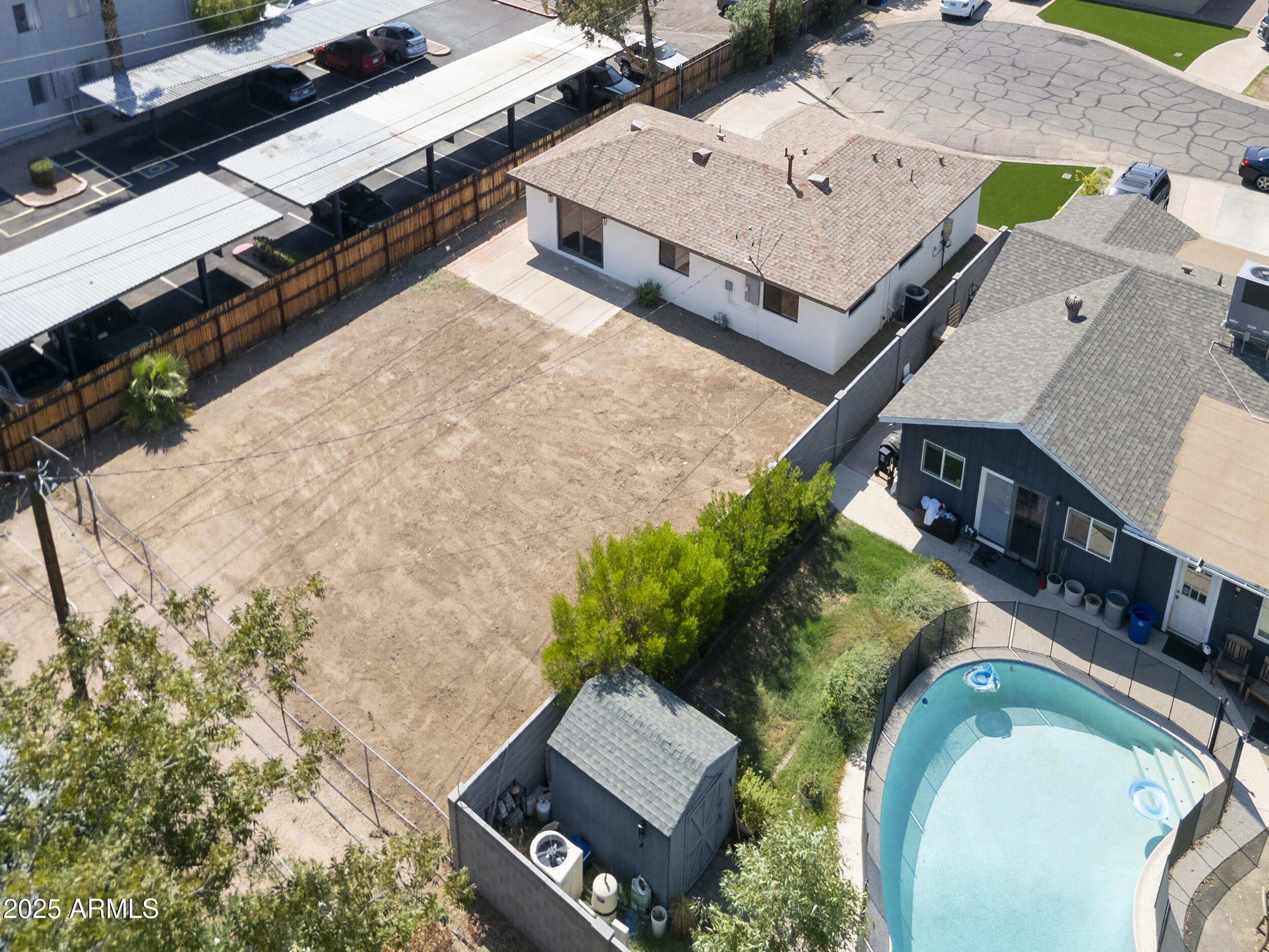 1046 East Elm Street Phoenix, AZ 85014 - Photo 29 of 31 an aerial view of a house with a yard and trees