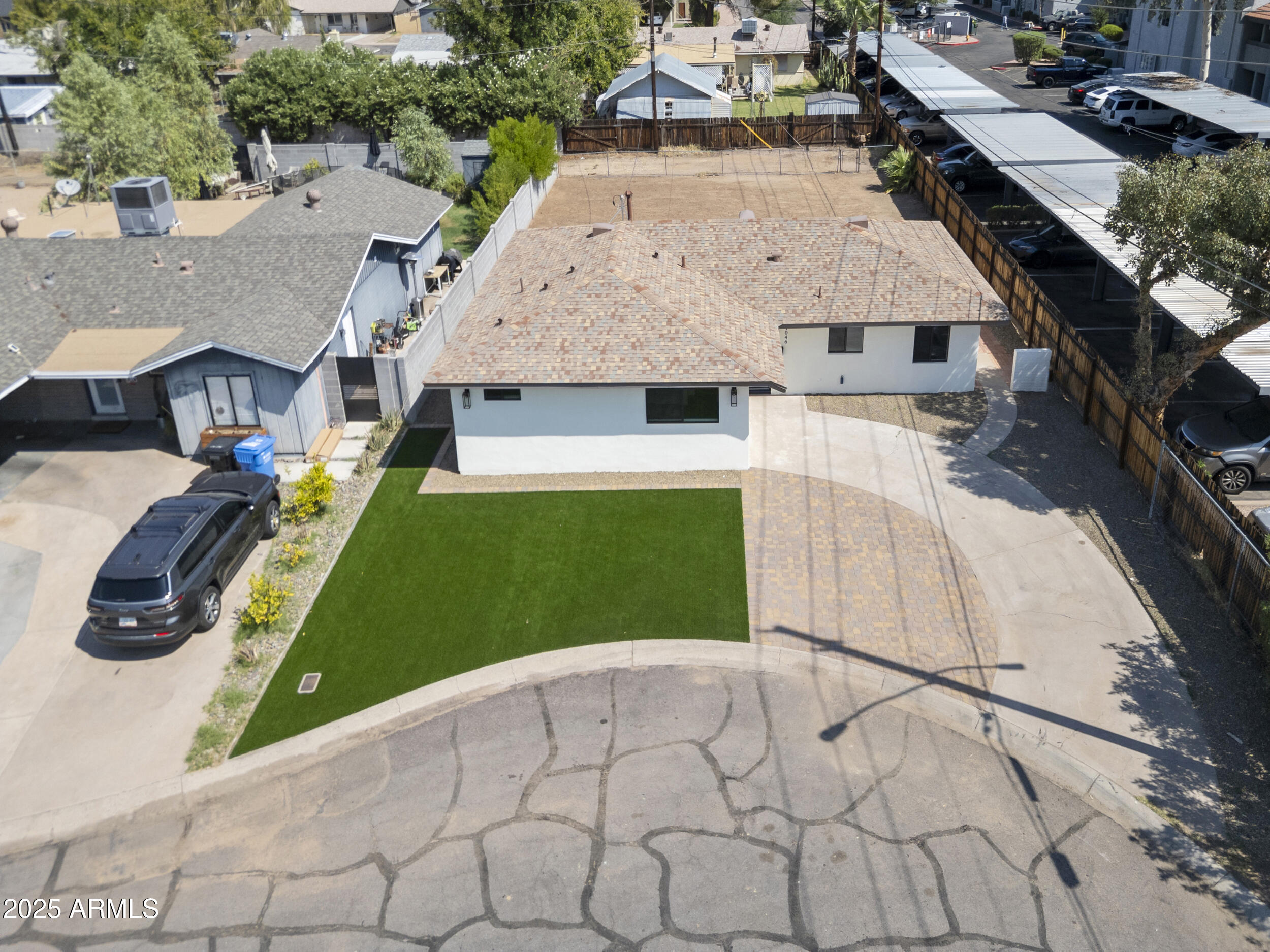 1046 East Elm Street Phoenix, AZ 85014 - Photo 30 of 31 an aerial view of a house with a yard and trees
