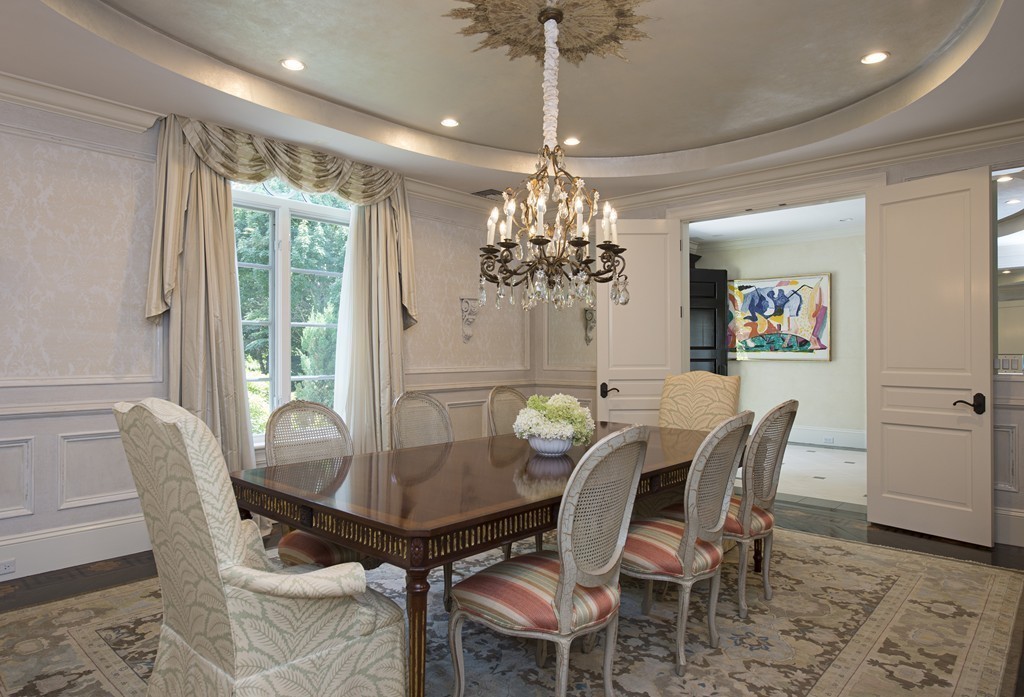 45 Young Road Weston, MA 02493 - Photo 16 of 18 a view of a dining room with furniture a chandelier and wooden floor