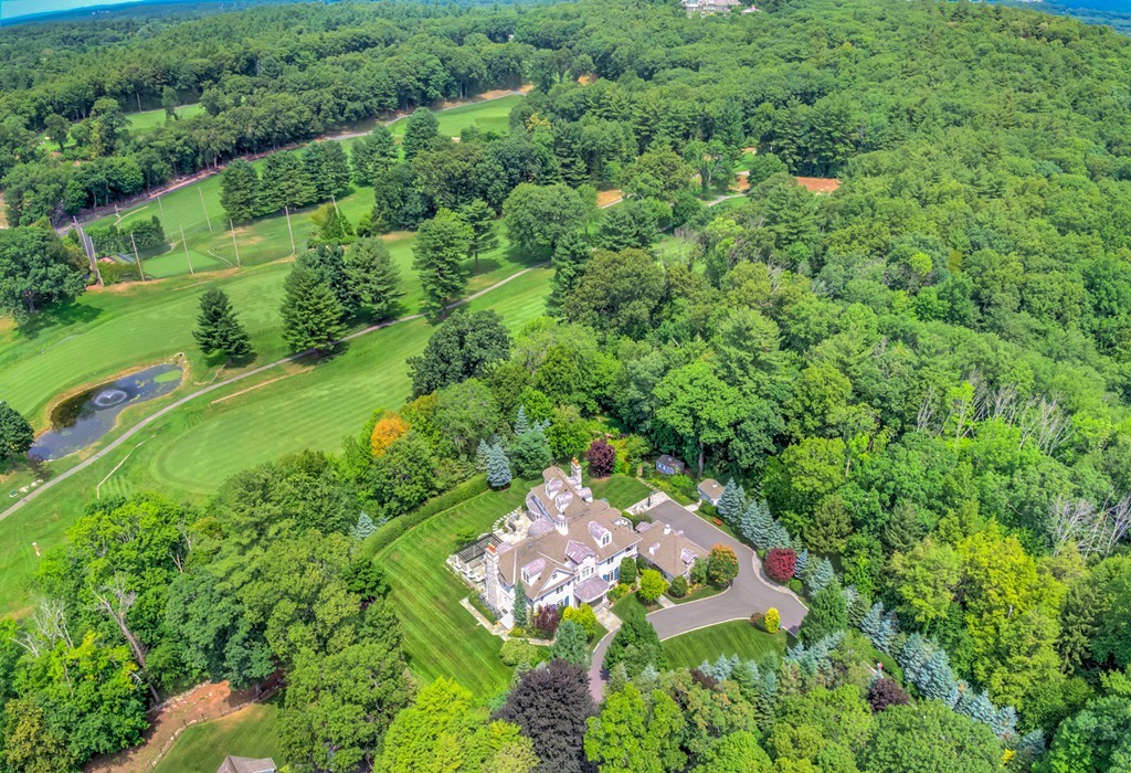 45 Young Road Weston, MA 02493 - Photo 18 of 18 an aerial view of residential house with outdoor space and trees all around