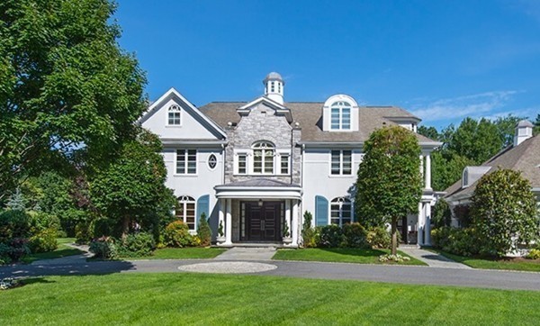 45 Young Road Weston, MA 02493 - Photo 2 of 18 a front view of a house with a yard