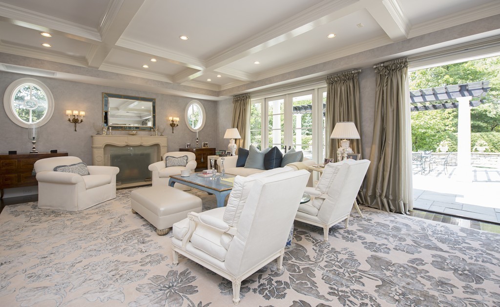 45 Young Road Weston, MA 02493 - Photo 5 of 18 a living room with patio furniture and a large window