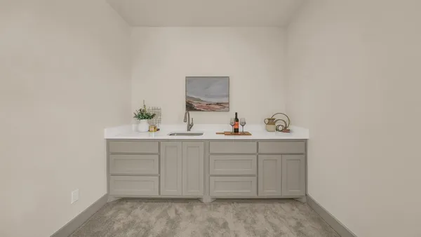 a bathroom with a toilet a sink a mirror and bathtub