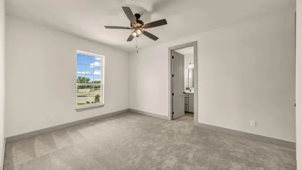 a view of an empty walk in closet