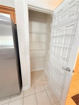 a bathroom with a glass door shower