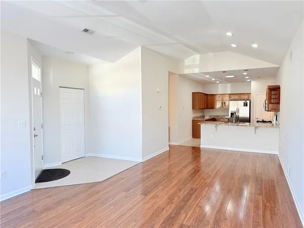 a view of kitchen with wooden floor