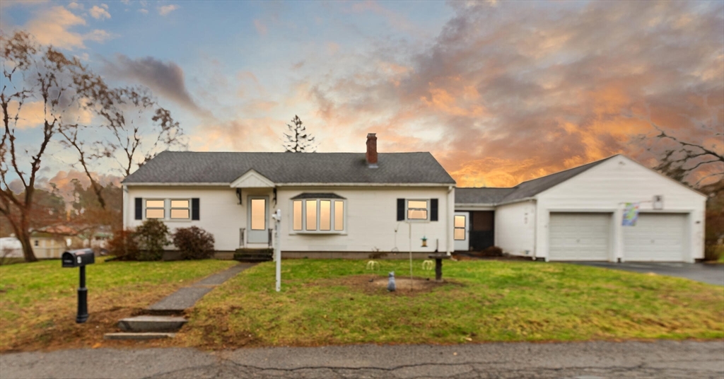 4 Vernon Street Ayer, MA 01432 - Photo 1 of 23 a front view of a house with garden