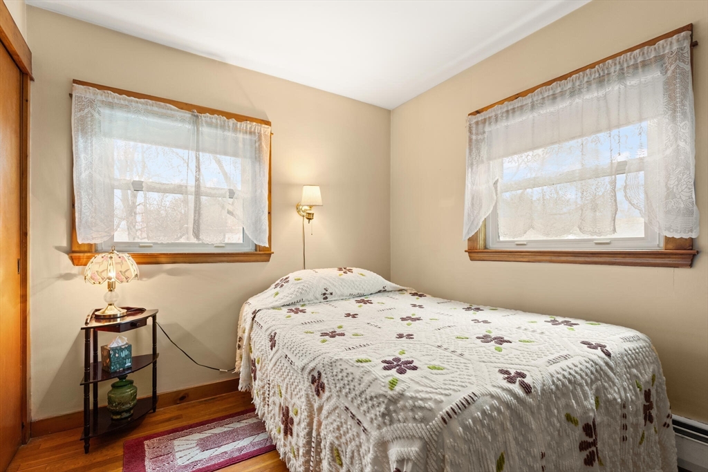 4 Vernon Street Ayer, MA 01432 - Photo 14 of 23 a bedroom with a bed and a window