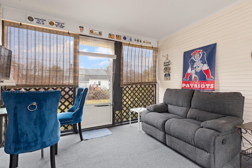 4 Vernon Street Ayer, MA 01432 - Photo 18 of 23 a living room with furniture and a window