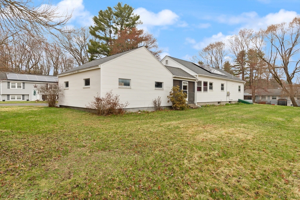 4 Vernon Street Ayer, MA 01432 - Photo 19 of 23 a view of a house with a yard