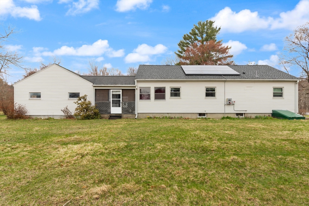 4 Vernon Street Ayer, MA 01432 - Photo 20 of 23 a view of a house with a backyard